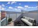 Rooftop deck with a seating area, perfect for relaxation and entertaining at 544 New Bern Station Ct, Charlotte, NC 28209