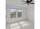 Bedroom with large window and ceiling fan at 5972 Rathlin Nw Ct, Concord, NC 28027