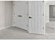 Bedroom with double closets and access to hallway at 5972 Rathlin Nw Ct, Concord, NC 28027