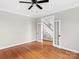 Sitting room with hardwood floors and French doors at 5972 Rathlin Nw Ct, Concord, NC 28027