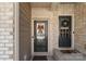 Close-up of inviting front doors adorned with wreaths, showcasing a warm and welcoming entrance at 6007 Cadence Ln, Indian Land, SC 29707