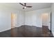 Spacious bedroom featuring hardwood floors, plenty of natural light, and multiple closets at 6503 Georgia Oak Rd, Charlotte, NC 28269