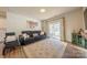 Living room with a sectional sofa and sliding glass doors to patio at 6525 Gopher Rd, Indian Land, SC 29707