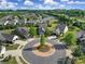 Aerial view of neighborhood homes and circular street at 730 Bushel Dr, Fort Mill, SC 29715