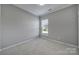 Bright bedroom with neutral wall paint and carpet at 730 Bushel Dr, Fort Mill, SC 29715