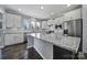 Modern kitchen with stainless steel appliances and granite countertops at 730 Bushel Dr, Fort Mill, SC 29715