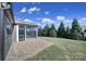 Brick paved patio adjacent to screened porch at 730 Bushel Dr, Fort Mill, SC 29715