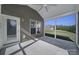 Screened porch with ceiling fan and backyard view at 730 Bushel Dr, Fort Mill, SC 29715