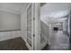 View of the staircase leading to the upper level and kitchen at 730 Bushel Dr, Fort Mill, SC 29715