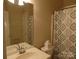 Clean bathroom with shower/tub combo and vanity at 9018 Kestral Ridge Dr, Charlotte, NC 28269