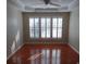 Bright bedroom with hardwood floors and plantation shutters at 9018 Kestral Ridge Dr, Charlotte, NC 28269