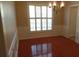 Formal dining room featuring hardwood floors and wainscoting at 9018 Kestral Ridge Dr, Charlotte, NC 28269