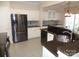 Modern kitchen with stainless steel appliances and granite countertops at 9018 Kestral Ridge Dr, Charlotte, NC 28269