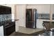 Stainless steel appliances and granite countertops in kitchen at 9018 Kestral Ridge Dr, Charlotte, NC 28269