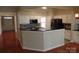 Kitchen features a large island and granite countertops at 9018 Kestral Ridge Dr, Charlotte, NC 28269