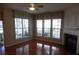 Bright living room with hardwood floors and fireplace at 9018 Kestral Ridge Dr, Charlotte, NC 28269