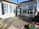 Spacious tiled patio adjacent to sunroom at 9018 Kestral Ridge Dr, Charlotte, NC 28269