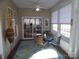 Sunroom with seating area and view of backyard at 9018 Kestral Ridge Dr, Charlotte, NC 28269