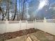 Private backyard with a white privacy fence at 908 Coffee Tree Ln, Rock Hill, SC 29732