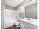 Bathroom with white vanity, tub, and tiled floor at 908 Coffee Tree Ln, Rock Hill, SC 29732