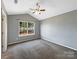 Bright bedroom featuring carpet, a ceiling fan and window at 908 Coffee Tree Ln, Rock Hill, SC 29732