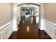 Grand entryway with hardwood floors and arched opening to the living area at 9140 Carneros Creek Rd, Charlotte, NC 28214