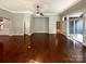 Spacious living room featuring hardwood floors and access to a patio at 9140 Carneros Creek Rd, Charlotte, NC 28214