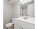 Clean bathroom, featuring a vanity, toilet and shower at 9325 Old Concord Rd # C, Charlotte, NC 28213