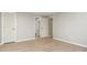 Bright bedroom with laminate flooring and access to bathroom at 9325 Old Concord Rd # C, Charlotte, NC 28213