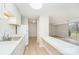 White kitchen with stainless steel appliances at 9325 Old Concord Rd # C, Charlotte, NC 28213