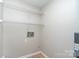 Laundry closet with wire shelving at 9325 Old Concord Rd # C, Charlotte, NC 28213