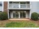 Private patio with sliding glass doors at 9325 Old Concord Rd # C, Charlotte, NC 28213