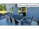 Spacious patio with large table and chairs, perfect for outdoor dining at 1002 Merganser Way, Indian Trail, NC 28079