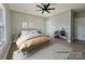 Virtually staged bedroom with a large bed and modern decor at 1008 Harrogate Dr, Bessemer City, NC 28016