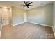 Bright bedroom with ceiling fan and light wood flooring at 1008 Harrogate Dr, Bessemer City, NC 28016