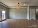 Simple dining room with light walls and hardwood floors at 1008 Harrogate Dr, Bessemer City, NC 28016
