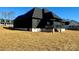 View of home's backyard, showcasing a large deck at 1008 Harrogate Dr, Bessemer City, NC 28016