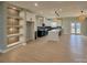 Open concept kitchen with island, stainless steel appliances, and dark cabinets at 1008 Harrogate Dr, Bessemer City, NC 28016