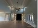 Spacious living area with high ceilings and modern fireplace at 1008 Harrogate Dr, Bessemer City, NC 28016