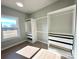 Large walk-in closet with ample shelving and hanging space at 1008 Harrogate Dr, Bessemer City, NC 28016