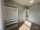 Large walk-in closet with ample shelving and hanging space at 1008 Harrogate Dr, Bessemer City, NC 28016