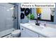 Modern bathroom with a shower, toilet, and vanity at 1023 Merganser Way, Indian Trail, NC 28079