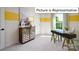 Bright home office with desk and stylish storage at 1023 Merganser Way, Indian Trail, NC 28079