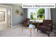 Sitting area with two chairs, a coffee table, and natural light at 1023 Merganser Way, Indian Trail, NC 28079