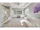 Luxurious bathroom showcasing a separate shower and tub, complemented by a spacious double vanity at 11006 Knight Castle Dr, Charlotte, NC 28277