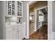Butler's pantry with cabinetry, countertops, and a view into other rooms at 11006 Knight Castle Dr, Charlotte, NC 28277