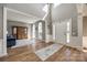 Bright foyer features hardwood floors, high ceilings, and an open layout for a welcoming first impression at 11006 Knight Castle Dr, Charlotte, NC 28277