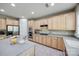 Spacious kitchen with plenty of wood cabinets, granite countertops, tile floors and stainless steel appliances at 11006 Knight Castle Dr, Charlotte, NC 28277