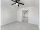 Simple bedroom with ceiling fan and access to another room at 1102 Dobson Dr, Waxhaw, NC 28173