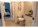 Cozy bathroom featuring tile floors and shower, with a bedroom view at 113 Angler Pl, Mooresville, NC 28117